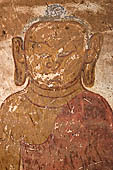 Bagan Myanmar. Dhammayangyi temple. Mural painting of the walls representing Buddha. 